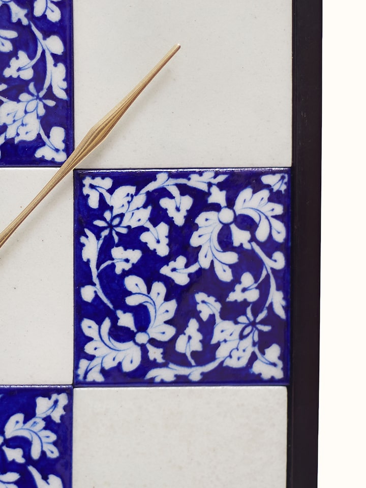 Detail shot of Blue Pottery Ceramic Wall Clock