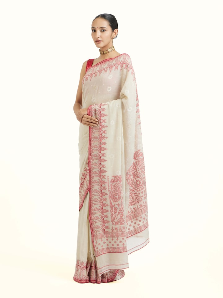 Side view of off-white cotton Bengal Jamdani saree with airy drape and soft fall