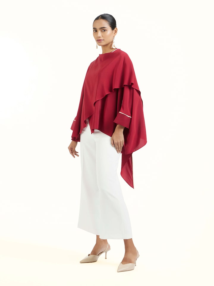 Side view of red silk handloom top showcasing tailored fit
