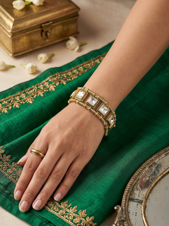 Styled view of Silver Smithing Bracelet worn on the wrist, showing how it looks styled, from a different angle