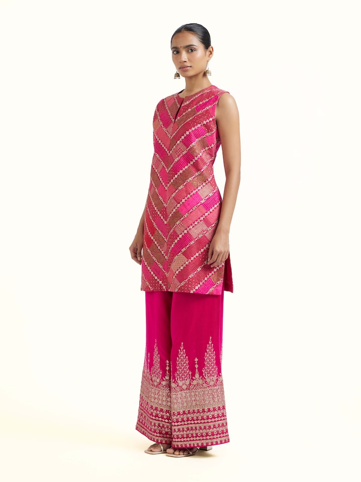 Side view of pink silk hand embroidery kurta set with elegant silhouette and fit