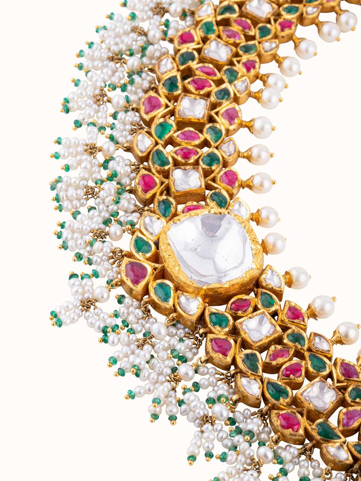 Front view of Jadau 18 karat gold collar necklace