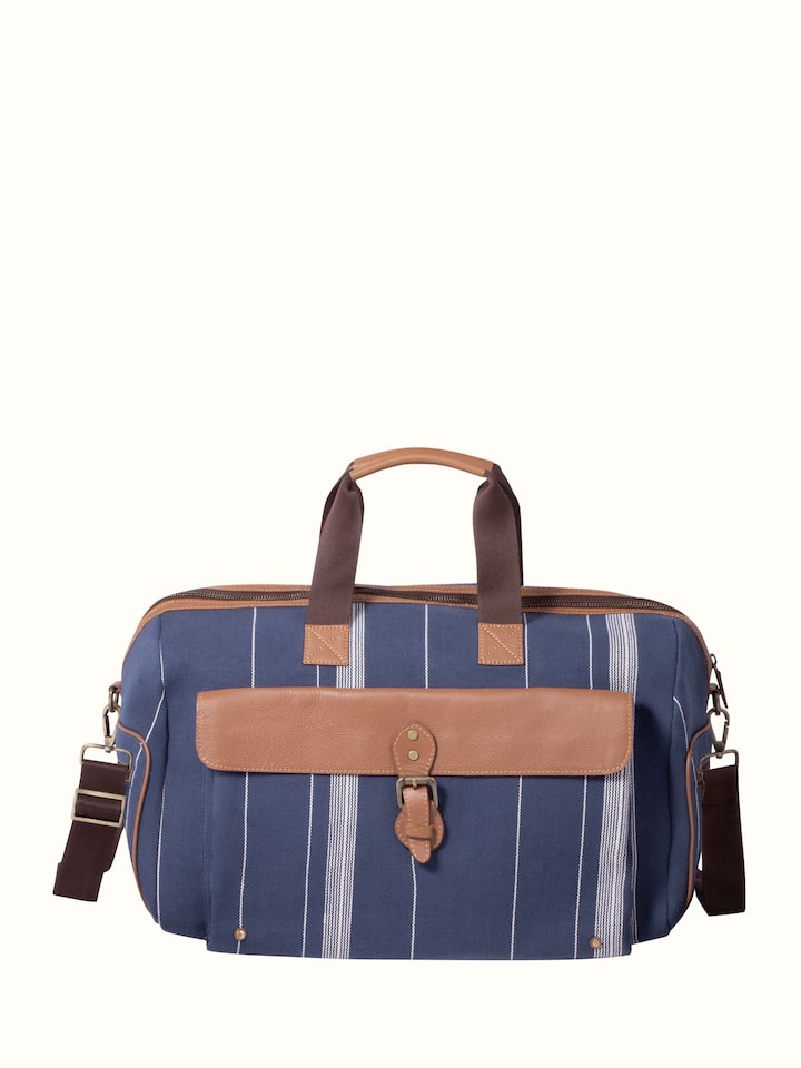 Front view of Blue Handloom Cotton Duffle Bag showcasing its traditional craftsmanship and design