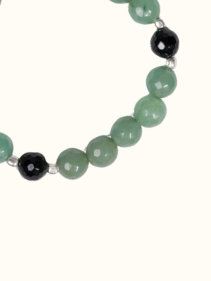 Lifestyle view of the Gemstone Black Onyx & Green Aventurine Silver Bracelet