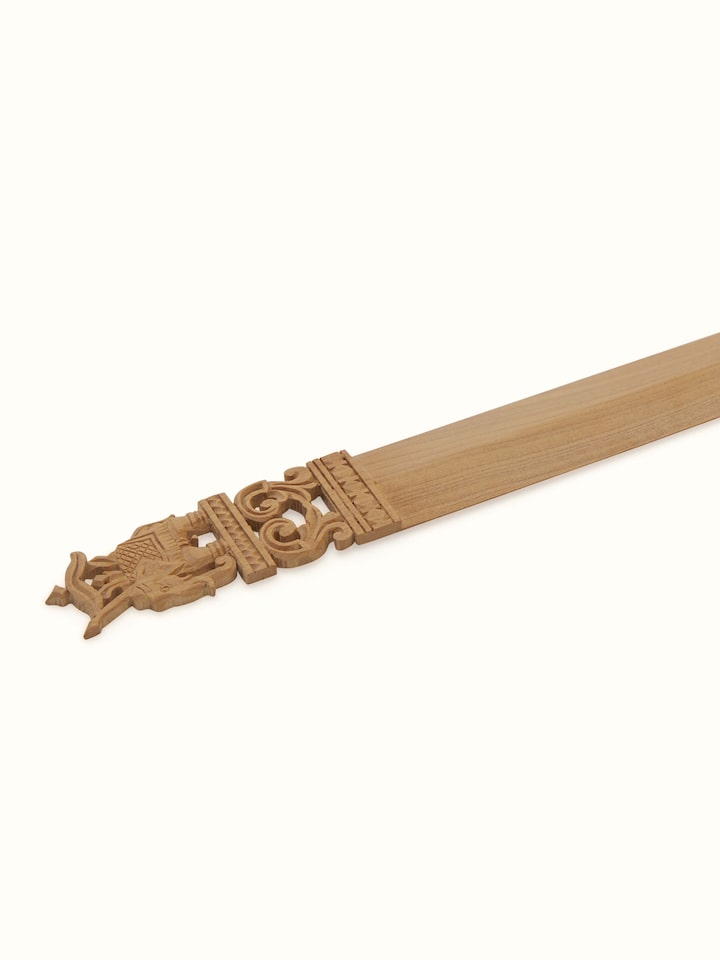 Back view of Carved Sandalwood Paper Cutter from Swadesh emphasizing its sturdy structure and smooth finish