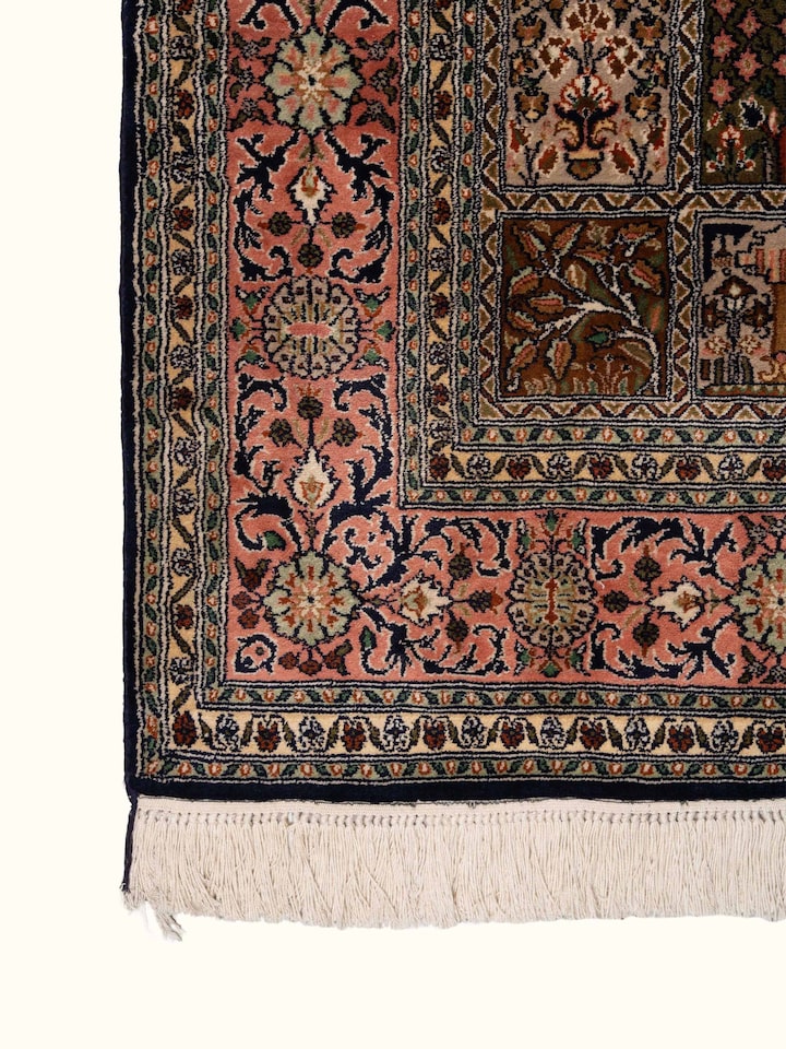 Detail view of Traditional Persian Pink Dabdar Kashmir Silk Hand-Knotted Carpet highlighting the intricate pattern and pile texture
