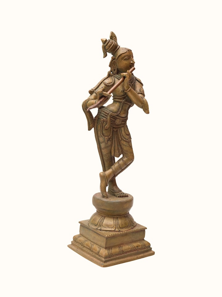 Angled view of the Bronze Cast Krishna Idol