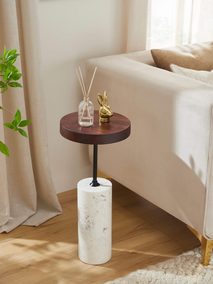 lifestyle view of marble stone carving walnut finish end and side table