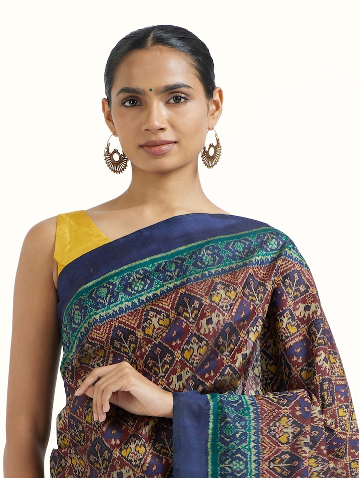 angled view of rajkot micro patola saree