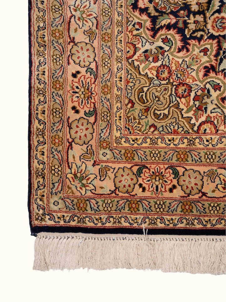 Detail view of Traditional Persian Navy Kashan Kashmir Silk Hand-Knotted Carpet highlighting the intricate pattern and pile texture