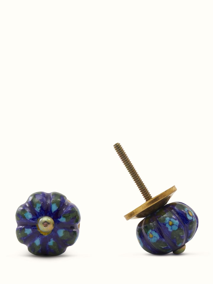 Angled view of Blue Pottery Round Rib Door Knob Set