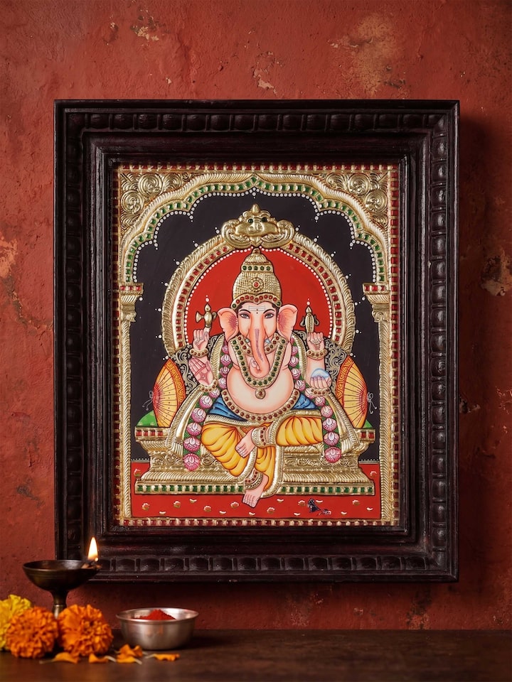 Styled view of Vinayaka Thanjavur Painting displayed against a styled backdrop