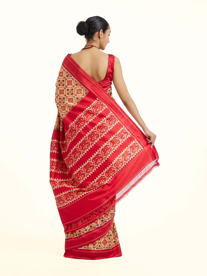 Back view of Cream Pochampally Double Ikat Silk Saree emphasizing the overall design and fine details