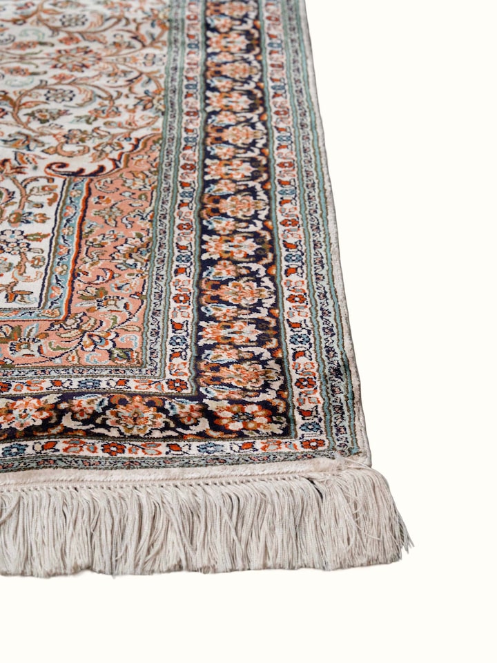 Close-up view of Traditional Persian Ivory Rust Kashan Kashmir Silk Hand-Knotted Carpet highlighting the hand-knotted weave and motif detail