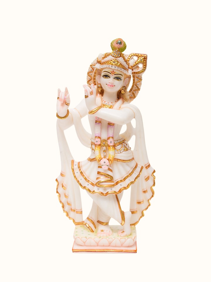 Front view of the Marble Carved Krishna Idol
