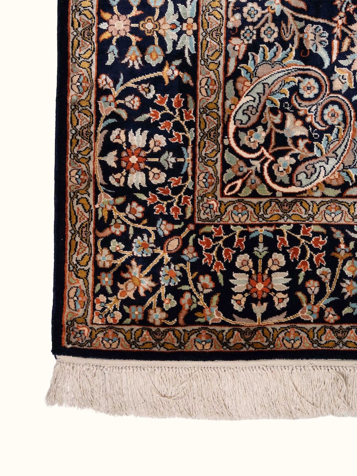Detail view of Traditional Persian Navy Mahal Kashmir Silk Hand-Knotted Carpet highlighting the intricate pattern and pile texture