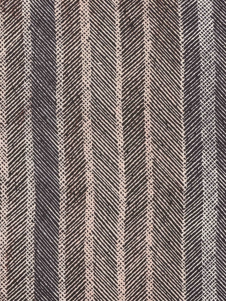 Close-up of hand block print pattern and fine linen-cotton blend fabric.