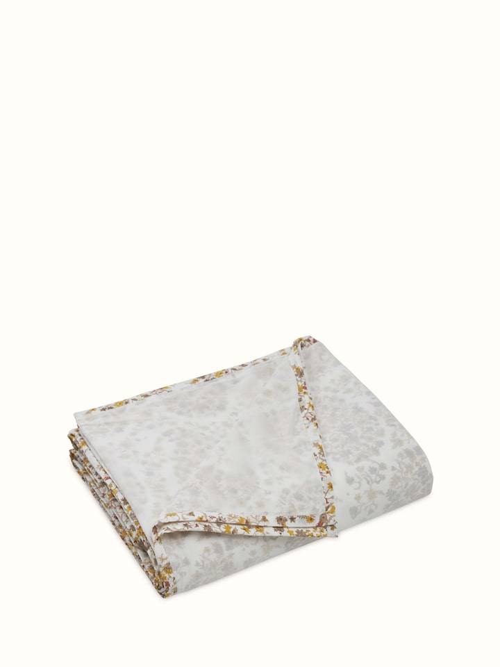 Angled view highlighting red paisley motifs and soft cotton texture of Sanganeri single dohar.