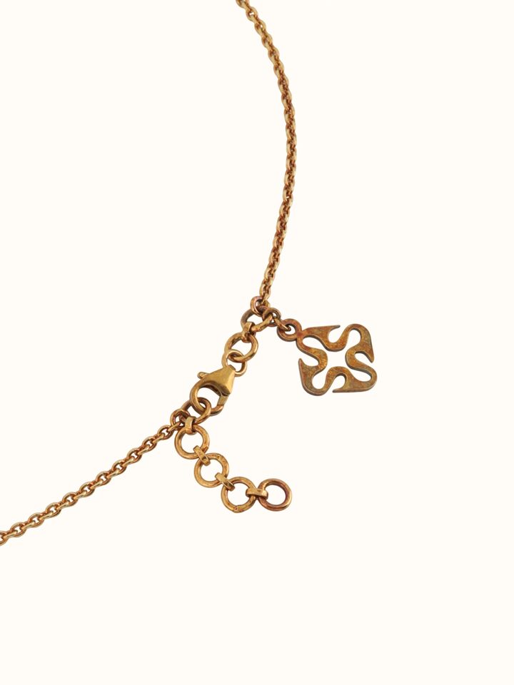 close-up view of tarkashi silver long necklace craftsmanship