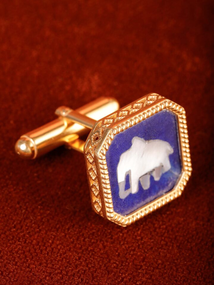 Close-up of Parchinkari inlay work on silver cufflinks