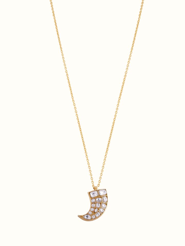Front view highlighting the intricate detailing and polished silver finish of the pendant