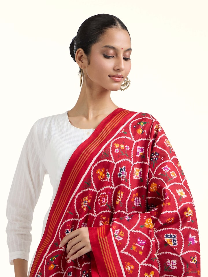 Angled view of Patan Patola Handloom Silk Dupatta revealing the depth of its color and intricate pattern