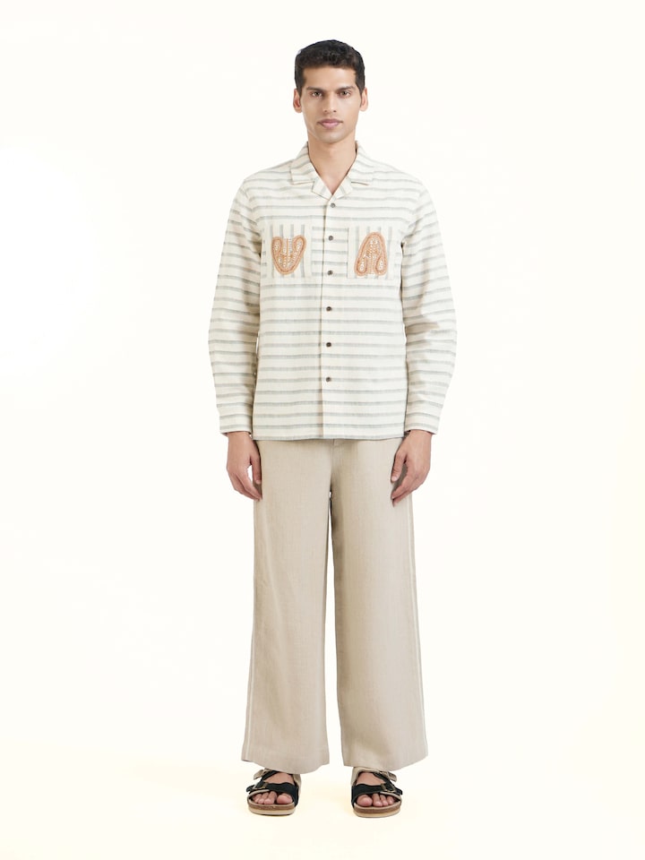 Front view of Ivory Kutchi Embroidered Shirt showcasing its traditional craftsmanship and design