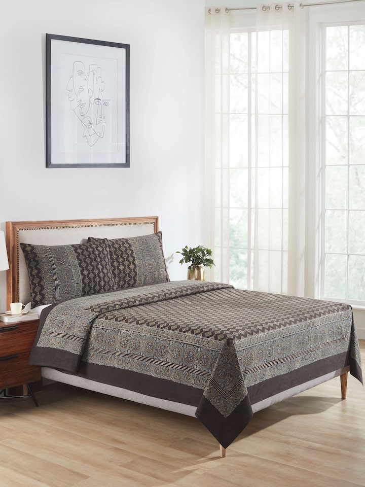 Side view of Sindh dark brown jaal cotton Ajrakh block printed king bedspread set (3 pcs) showcasing the block print pattern and rich color.