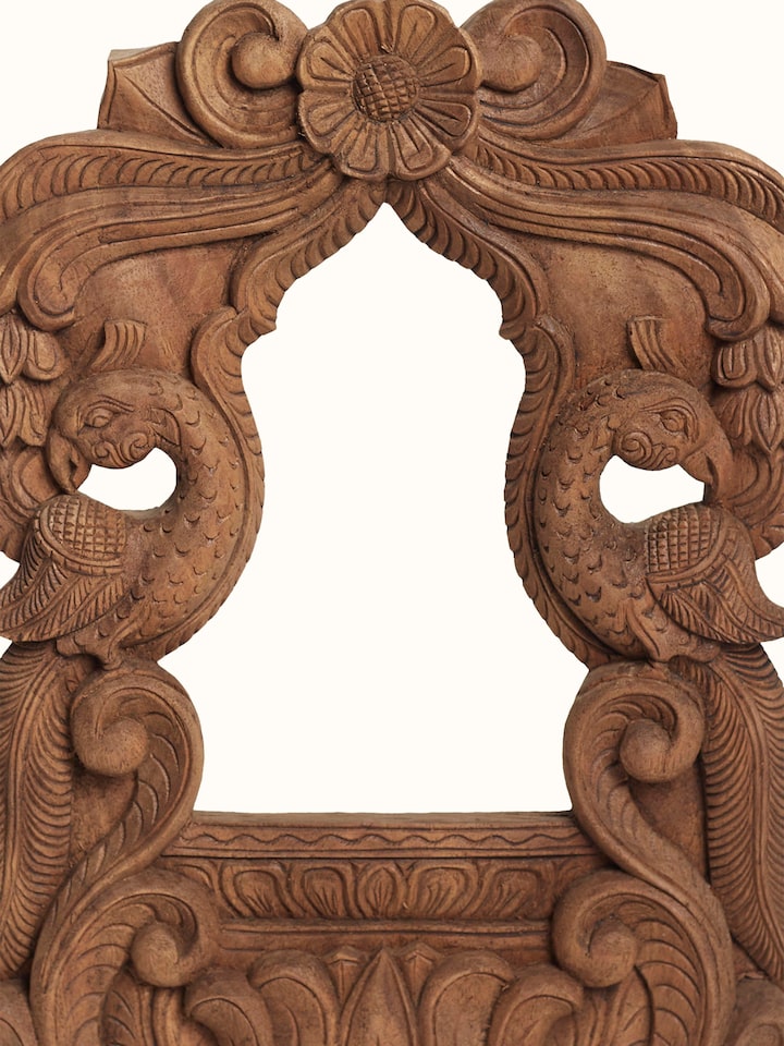 Detail view of the Wood Carved Parrot Mirror Frame