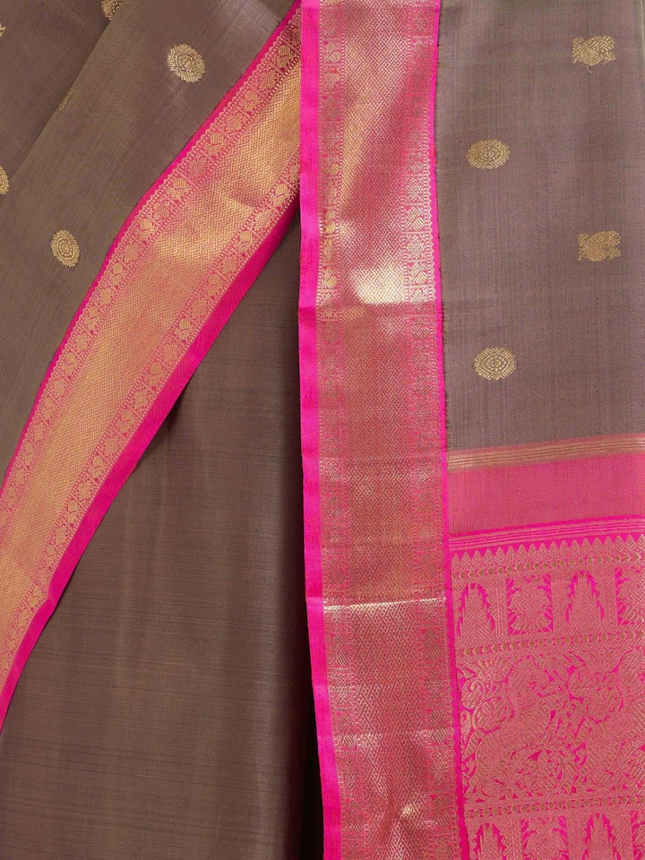 Detail view of dark grey silk Kancheepuram saree showing silk texture and zari craftsmanship
