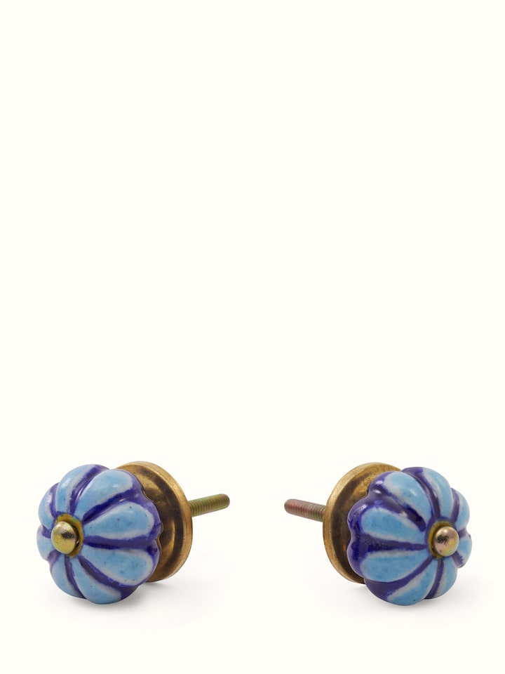 Angled view of Blue Pottery Round Rib Door Knob Set
