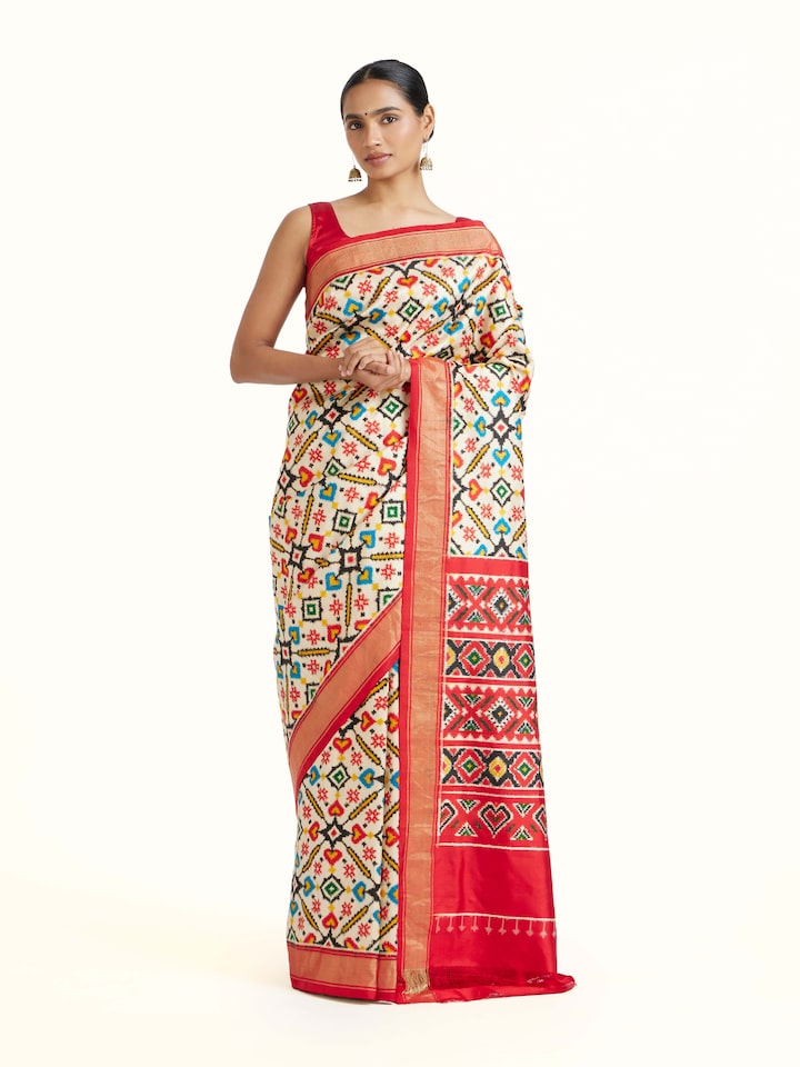 Front view of Cream Double Ikat Silk Saree showcasing its traditional craftsmanship and design