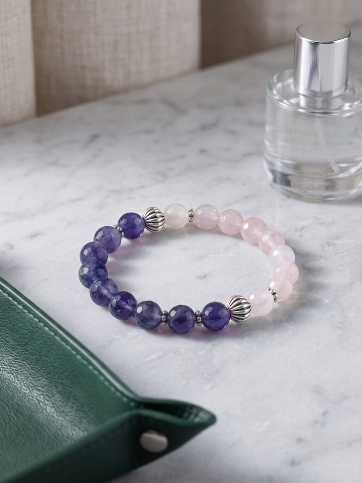Styled view of Gemstone Rose Quartz & Amethyst Bead Silver Bracelet worn on the wrist, showing how it looks styled, from a different angle