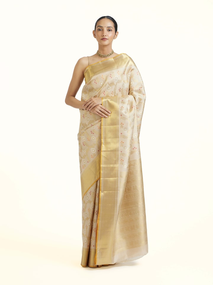 Front view of Beige Kancheepuram Silk Zari Saree showcasing its traditional craftsmanship and design