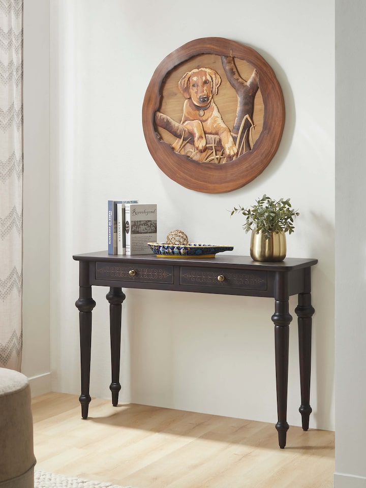 Close-up of the brass tarkashi detailing on the Sheesham wood console table, showcasing the intricate craftsmanship.