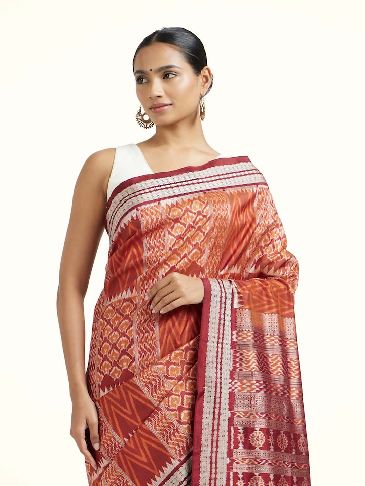 Angled view of the Brown Mulberry Silk Bandha Odisha Saree