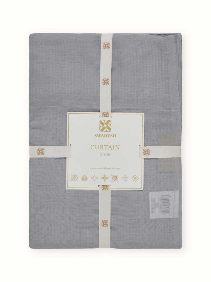 Detail shot showing weave detail and transparency of Pragya Grey Sheer Curtain
