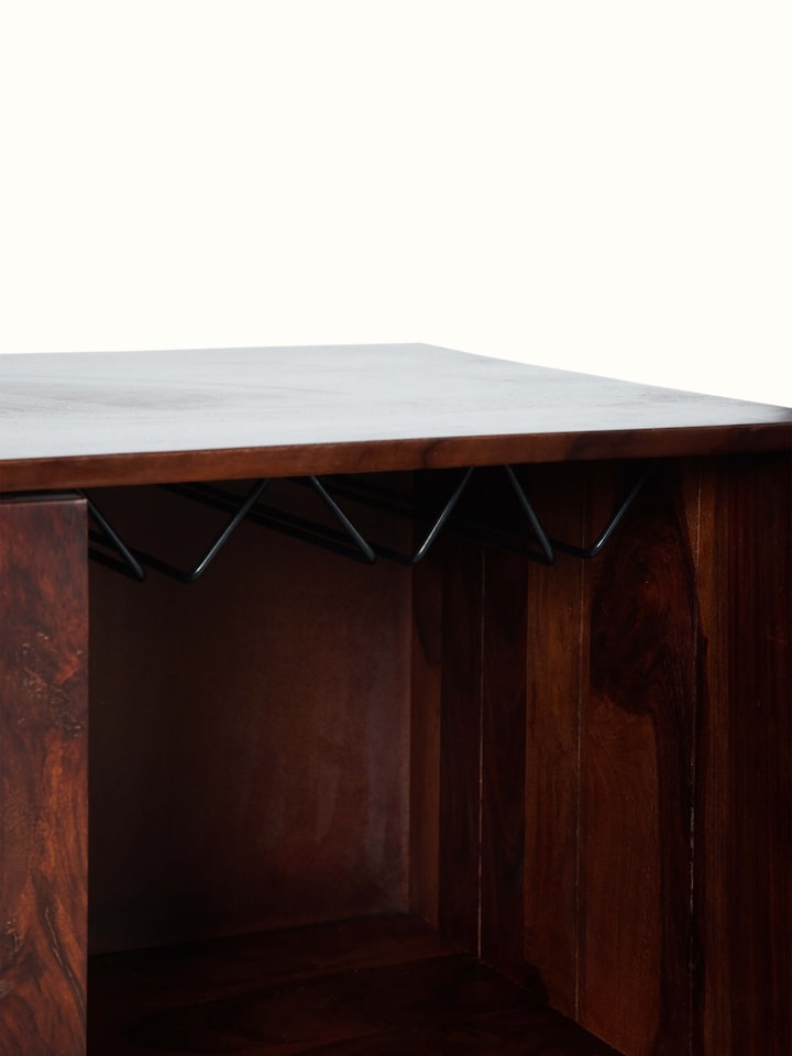 Full view of the Sheesham wood and cane bar cabinet from a different angle, showing its versatility and style.