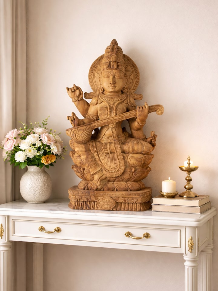 Side view of the Wood Carved Saraswati Idol