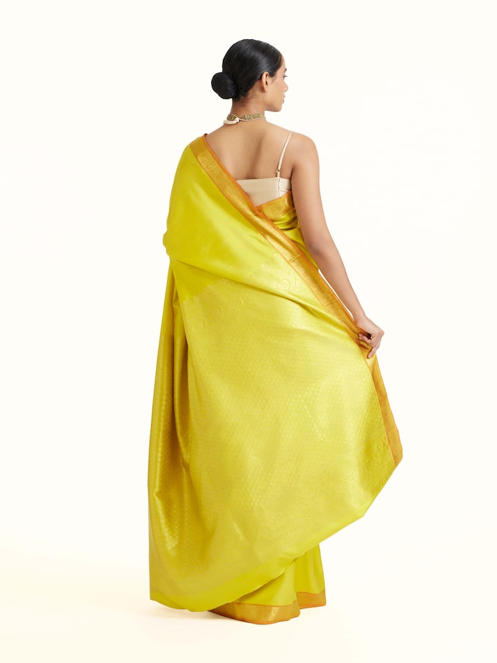 Back view of Mustard Silk Dharmavaram Saree emphasizing the overall design and fine details
