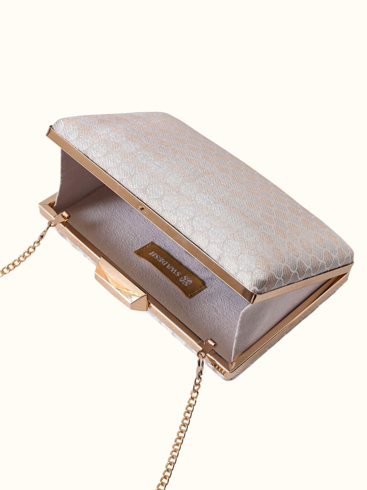 Top angled view of the Silver Handwoven Brocade Clutch
