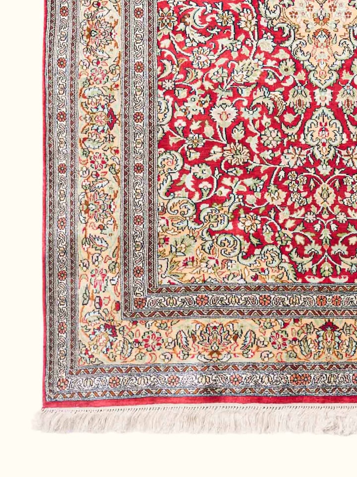 Close-up of the Traditional Persian Navy Ochre Tabriz Kashmir Silk Hand-Knotted Carpet pattern