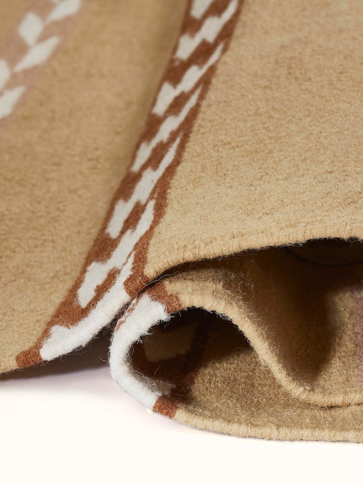 Detailed shot emphasizing the quality of knotting and fabric finish