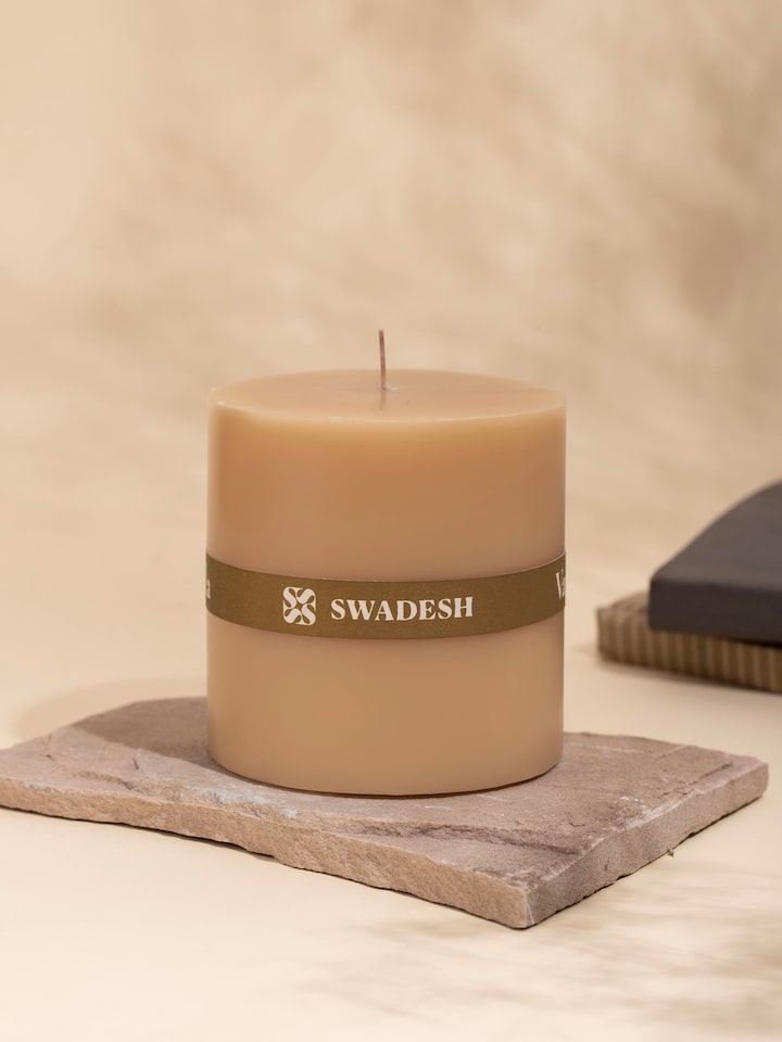 Side view of Vanilla pillar candle (3 inches) showing the smooth surface and classic design.