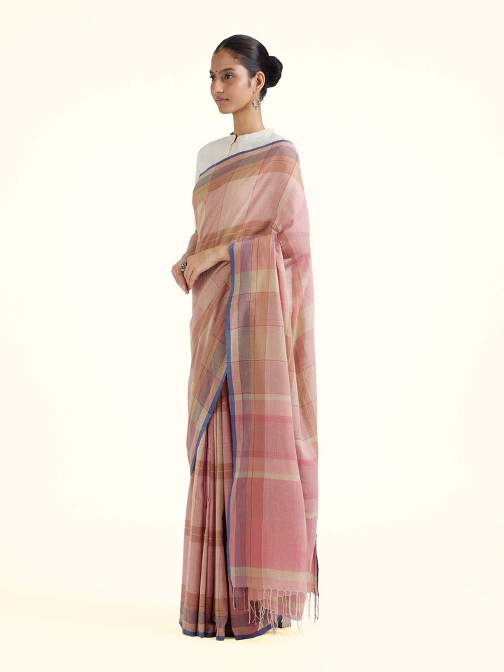 Side view of brown cotton Bengal Jamdani saree showcasing airy drape