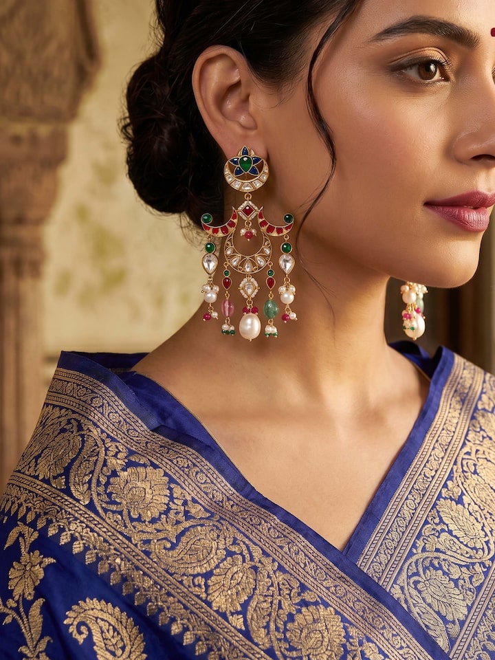 Styled view of Silver Smithing Drop Earrings worn on the ear, showing how it looks styled, from a different angle