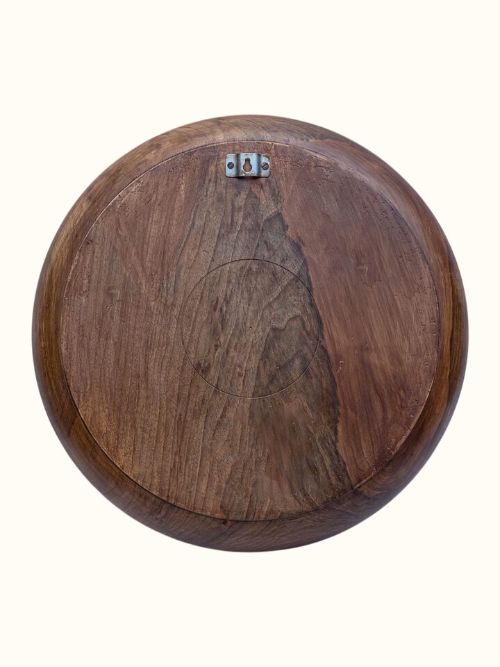 Detail view of the Gulistan Walnut Wood Display Plate