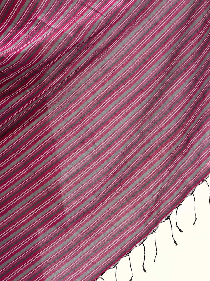 Detail view of pink silk Odisha ikat dupatta showing fabric weave