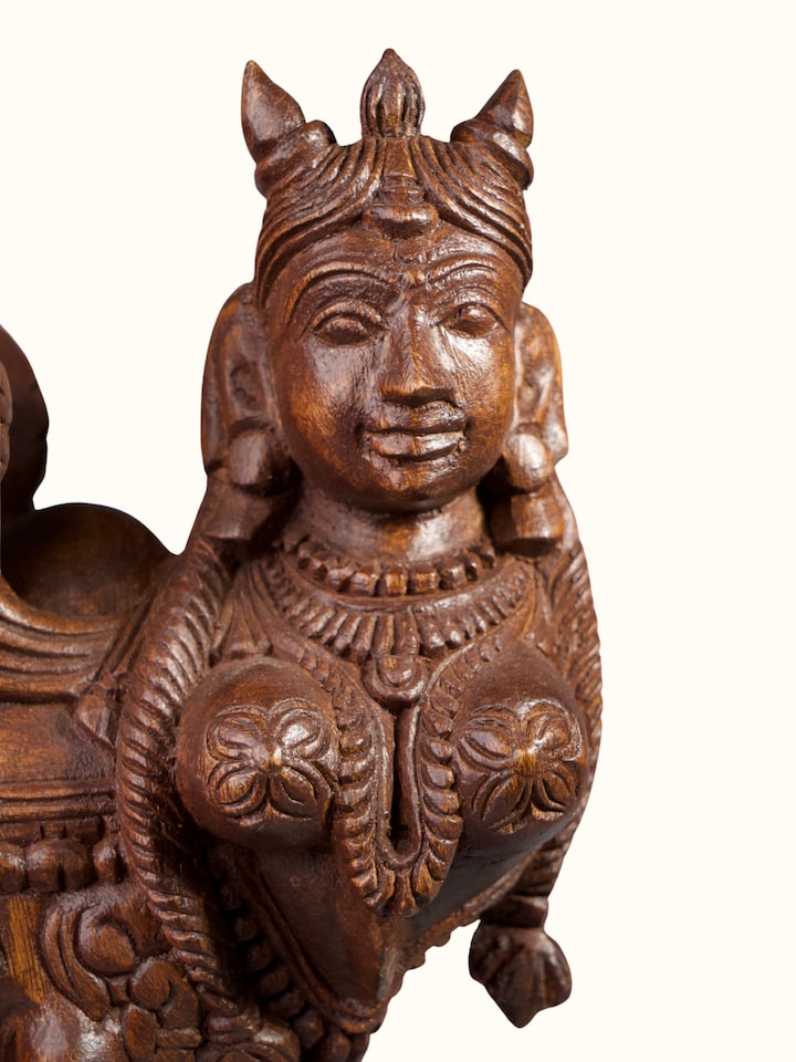 Detailed view of the Wood Carved Kamadhenu Idol