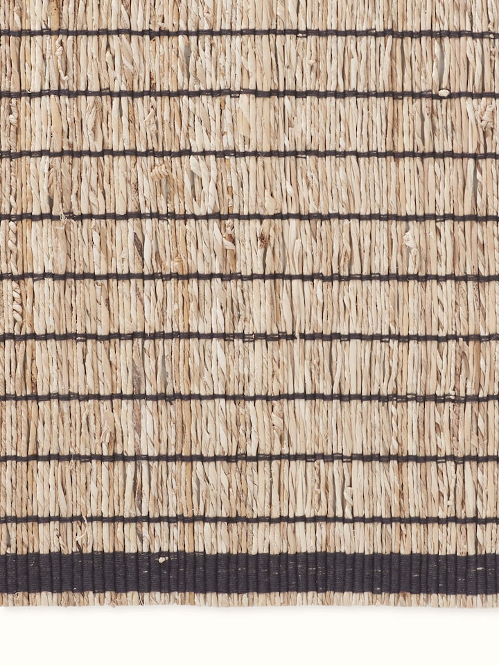 Side perspective highlighting the thickness and quality finish of each mat